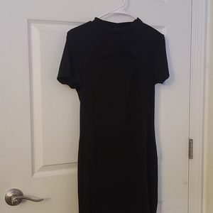 Short black dress with cleavage gap